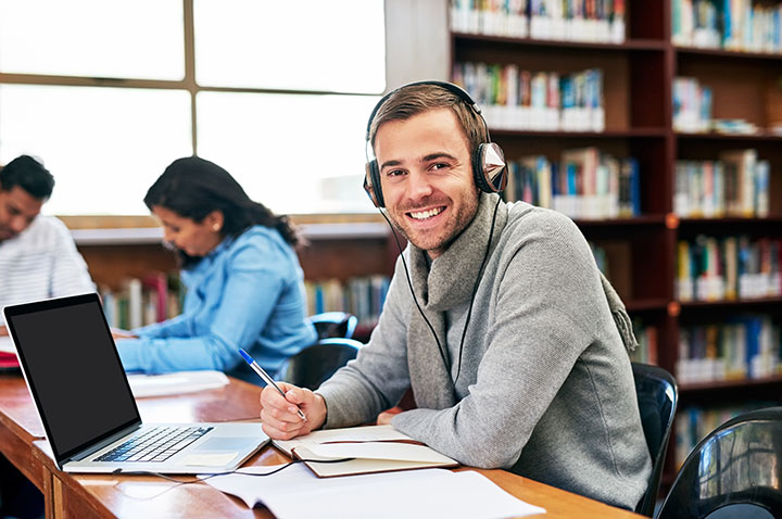 college student headphones citing audio video Chicago Author Date Style