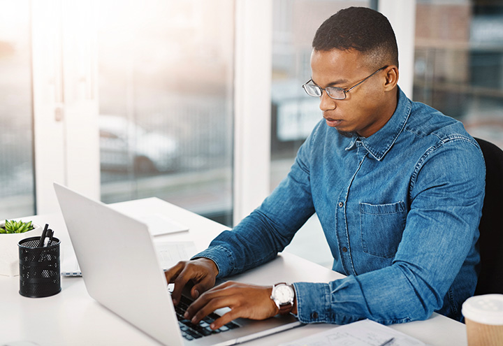 Businessman typing a Chicago in text website citation